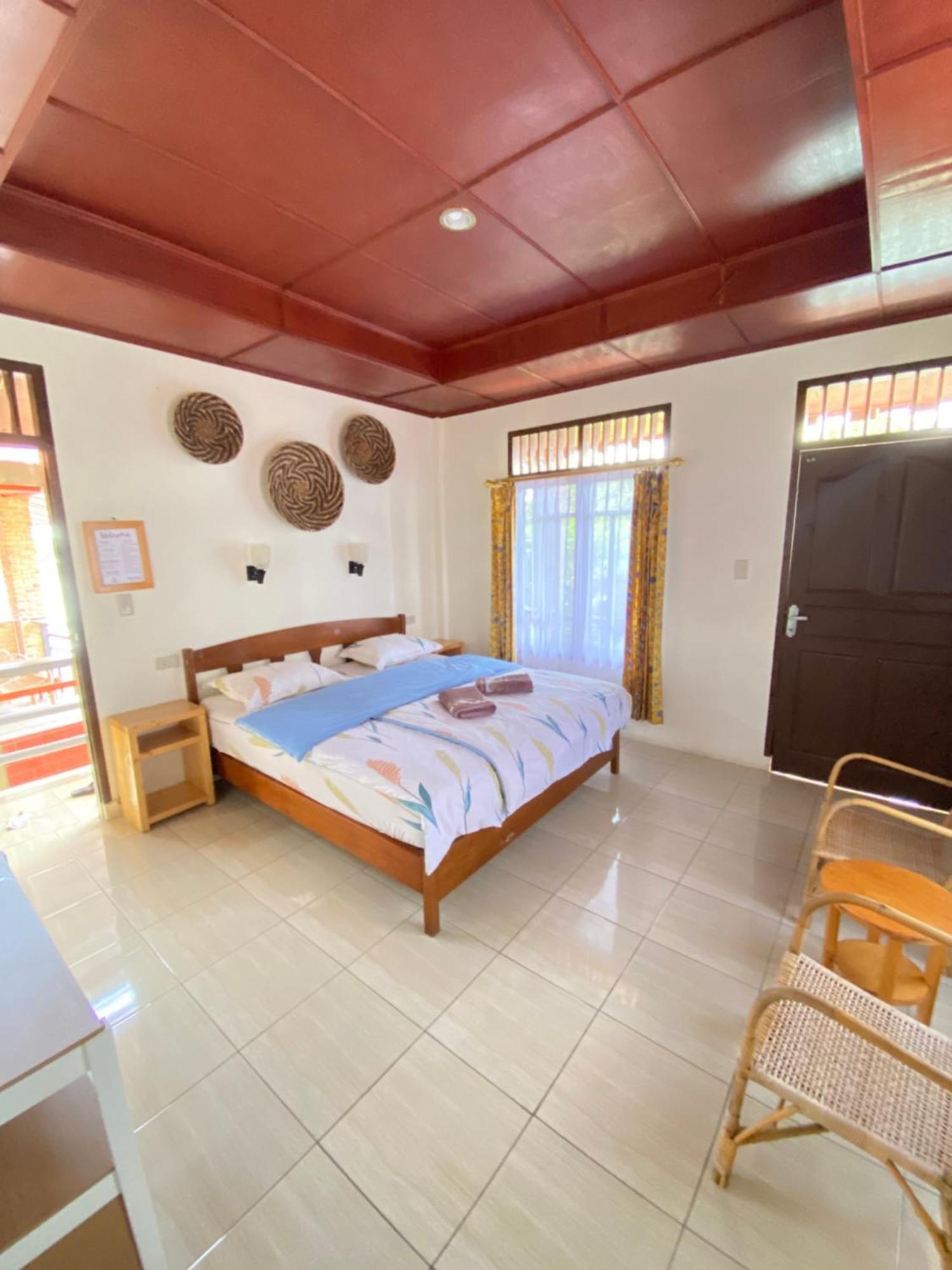 Romlan Hotel Tuk Tuk Bilik gambar