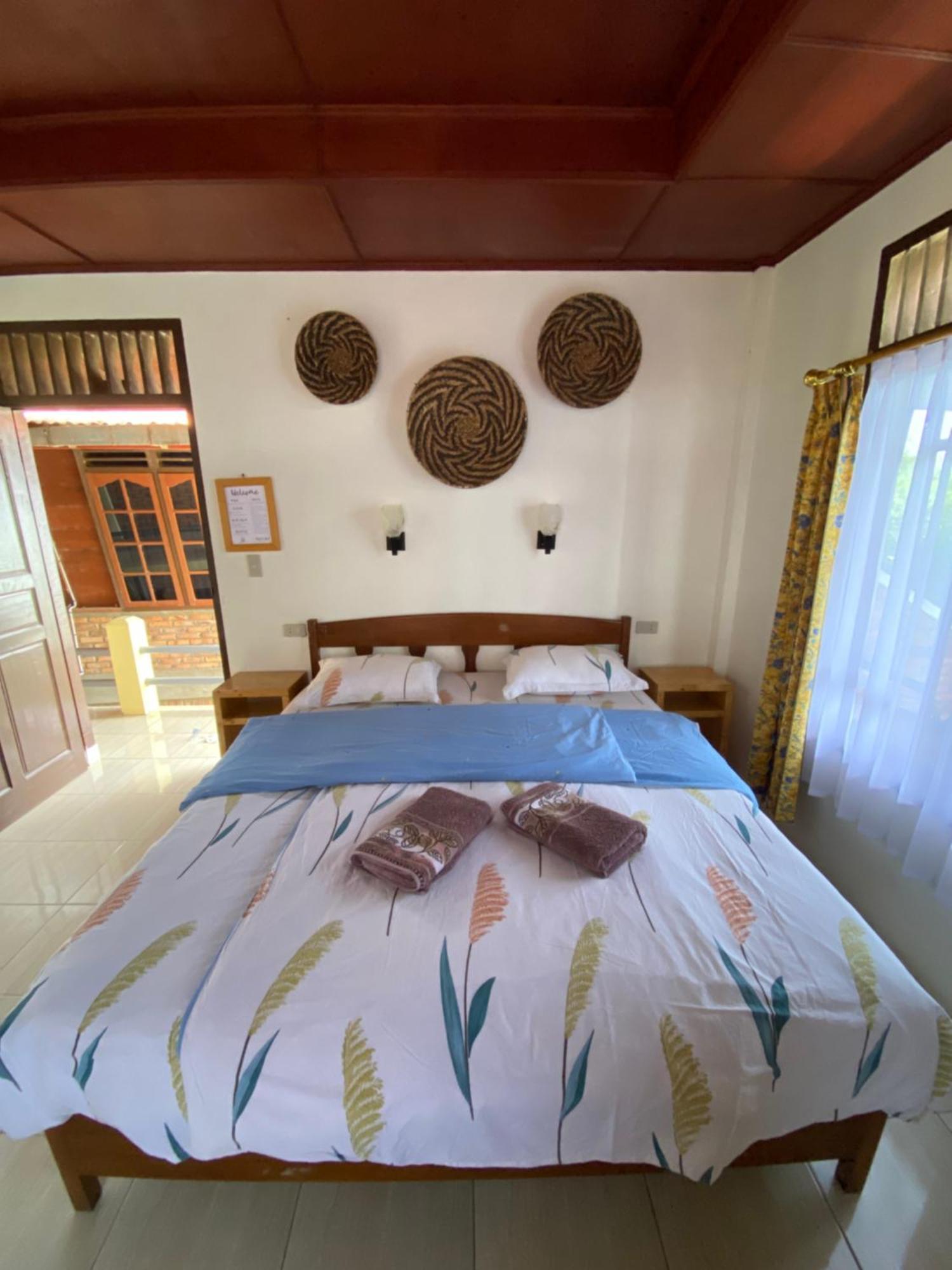 Romlan Hotel Tuk Tuk Bilik gambar
