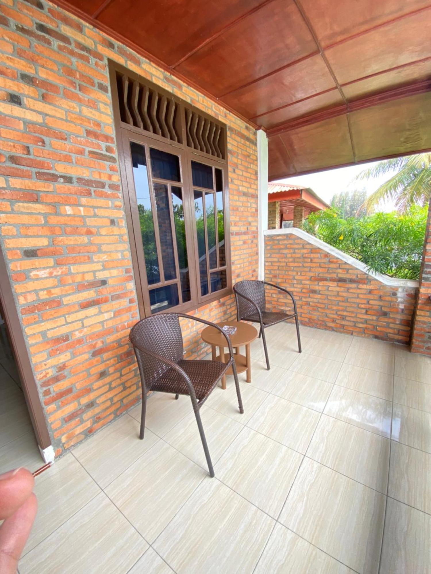 Romlan Hotel Tuk Tuk Bilik gambar