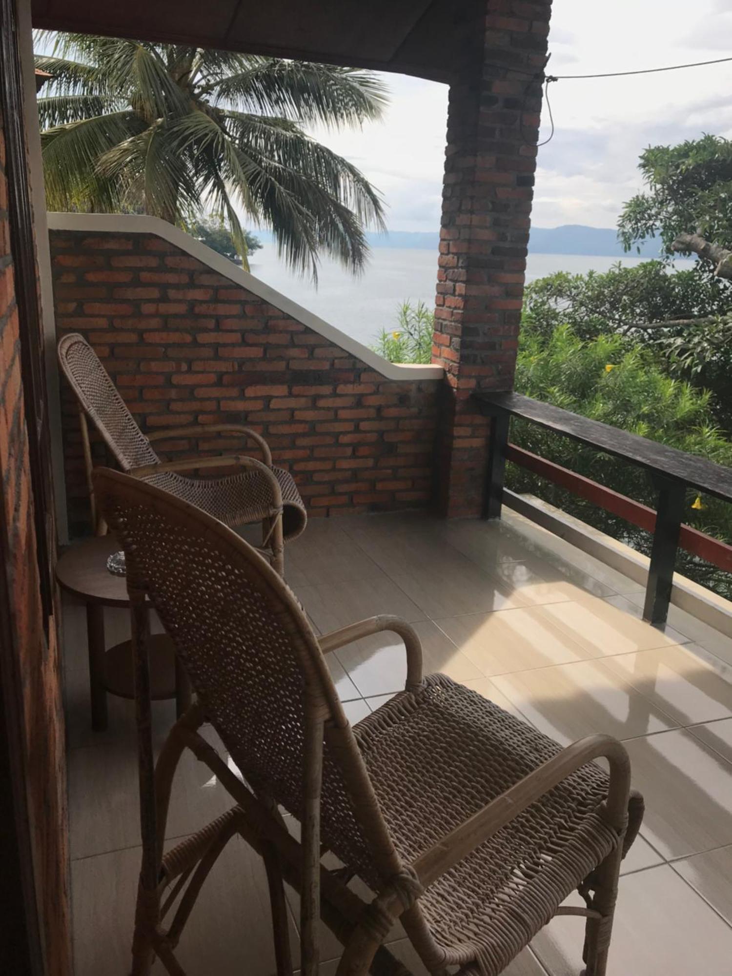 Romlan Hotel Tuk Tuk Bilik gambar
