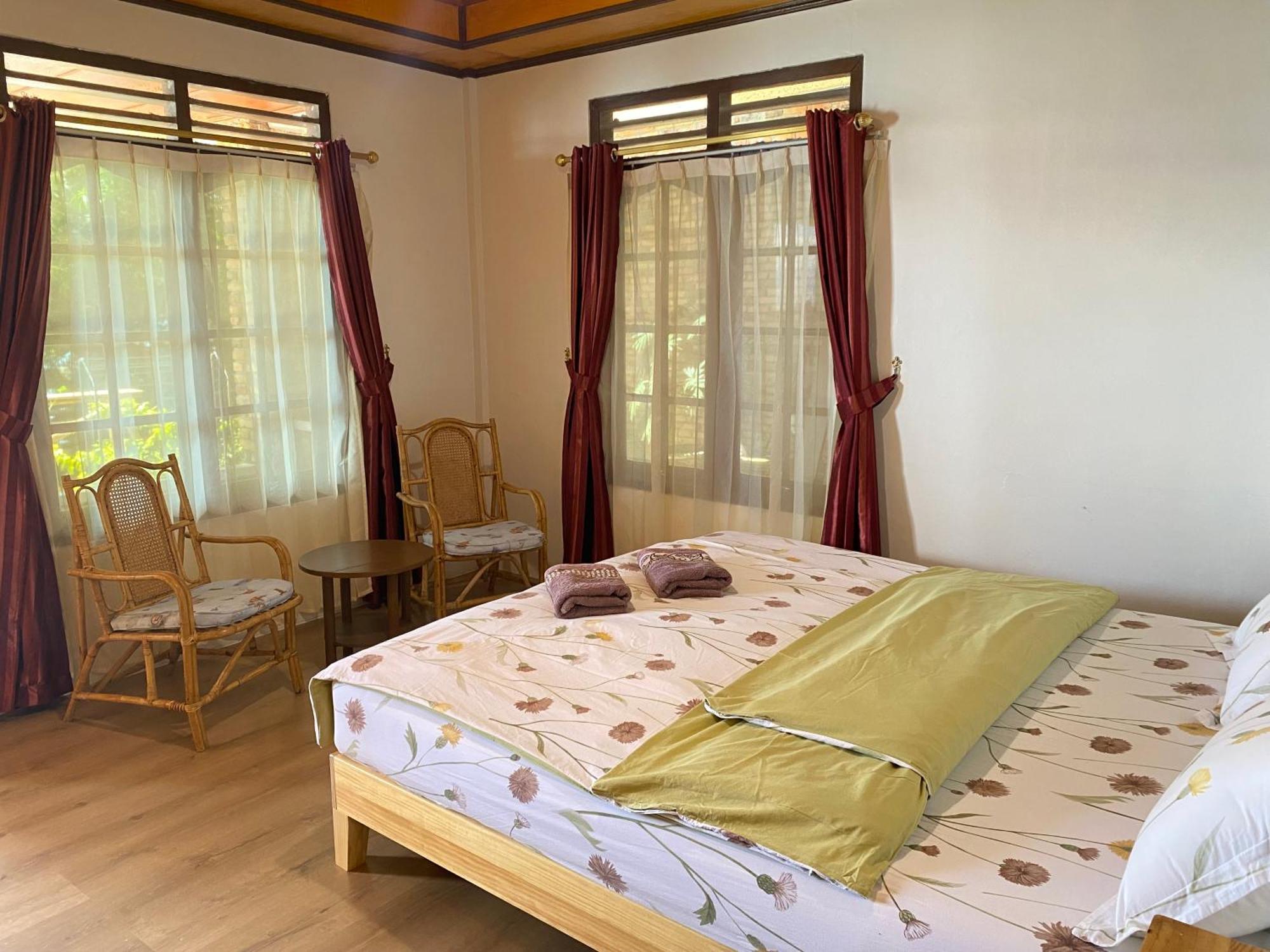 Romlan Hotel Tuk Tuk Bilik gambar
